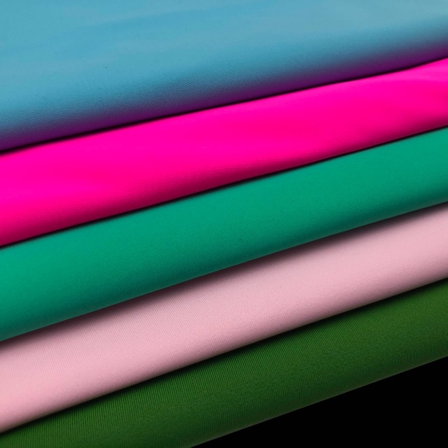 High Quality 85% Polyester 15% Spandex Warp Knitted Polyester Swimwear Fabric for Swimwear Garment 